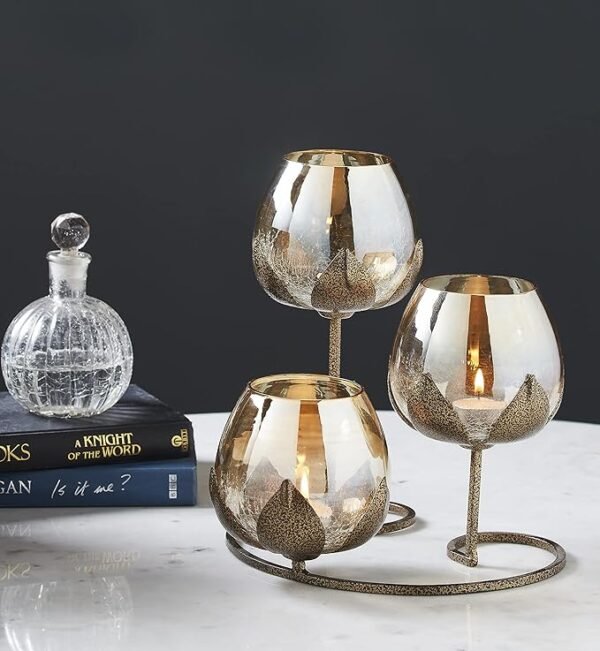 3-piece gold glass candle holder set for home decoration, dining table décor, and weddings, perfect for creating an elegant atmosphere.