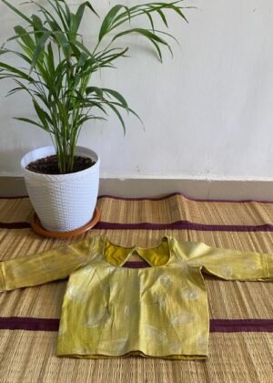 Handcrafted silk blouse in yellow with delicate patterns