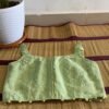 Green Sleeveless Designer Blouse with Threadwork Patterns and Front Button Design