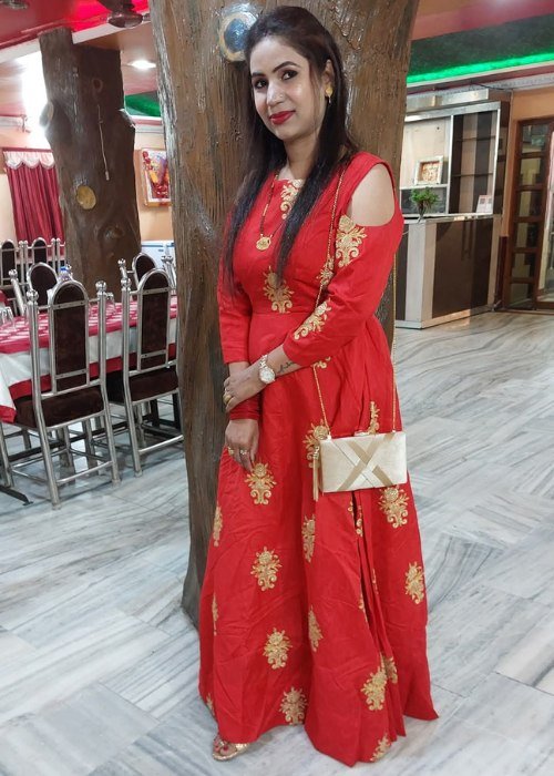 The Beautiful You Light Red Girls Clutch - Shivani Jaswal Light red clutch for girls with a sleek design, perfect for parties and casual outings.