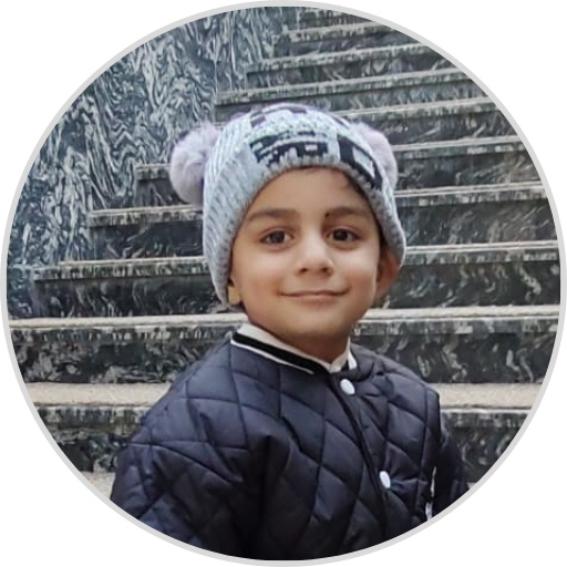 Vedansh Rajpoot, a cheerful young boy with an adorable smile and playful energy.