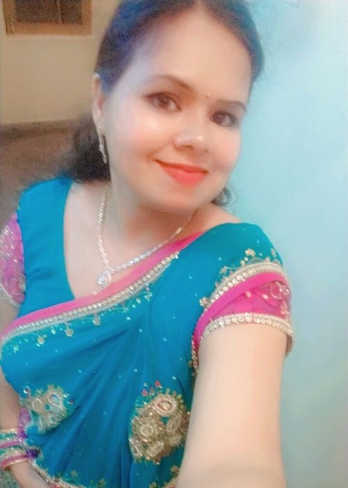 Ekta Sharma, a dedicated homemaker, spreading warmth and care in her family life.