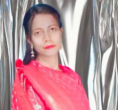 Padyabati Hansda, a dedicated homemaker, embracing family life with love and care.