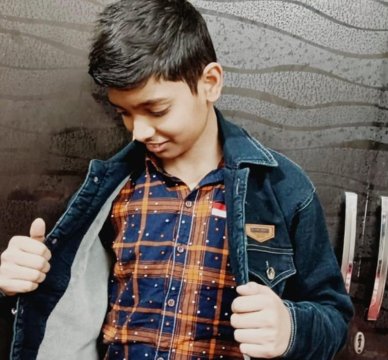 Samarth Kumar, a spirited and ambitious young boy, eager to explore the world and achieve his dreams with energy and passion.