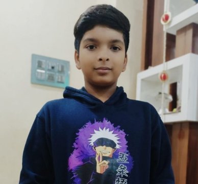 Adarsh Tiwari, an ambitious and energetic young boy, eager to learn and explore the world with enthusiasm and curiosity.