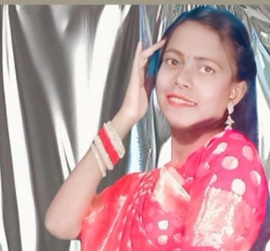 Padyabati Hansda, a dedicated homemaker, embracing family life with love and care.