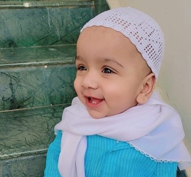 Ruman Siddiqui, a cheerful and curious young boy, radiating energy and creativity while embracing the excitement of learning and exploration.