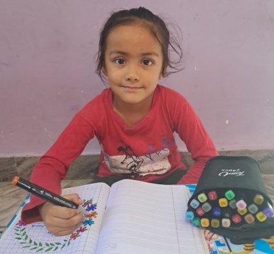 Anika Panwar, a cheerful young girl with a bright smile and curious eyes, spreading happiness and embracing life's little adventures.