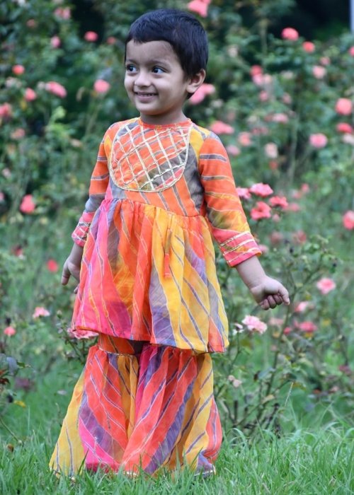 Aamaya Naithani, an adorable and lively young girl, radiating joy and curiosity with her bright smile and playful energy.