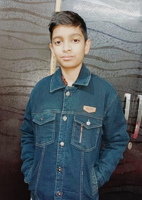 Samarth Kumar, a spirited and ambitious young boy, eager to explore the world and achieve his dreams with energy and passion.