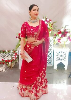 Fuchsia Net Embellished Ghagra Choli with Sequins Embroidery